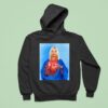 Dominik Wearing Santa Olivia Jesus Hoodie