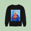 Dominik Wearing Santa Olivia Jesus Sweatshirt