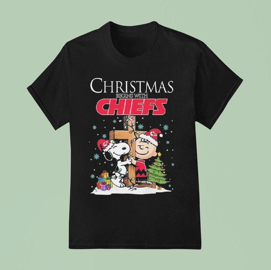 Snoopy And Charlie Brown Merry Christmas Begins With Kansas City Chiefs T Shirt