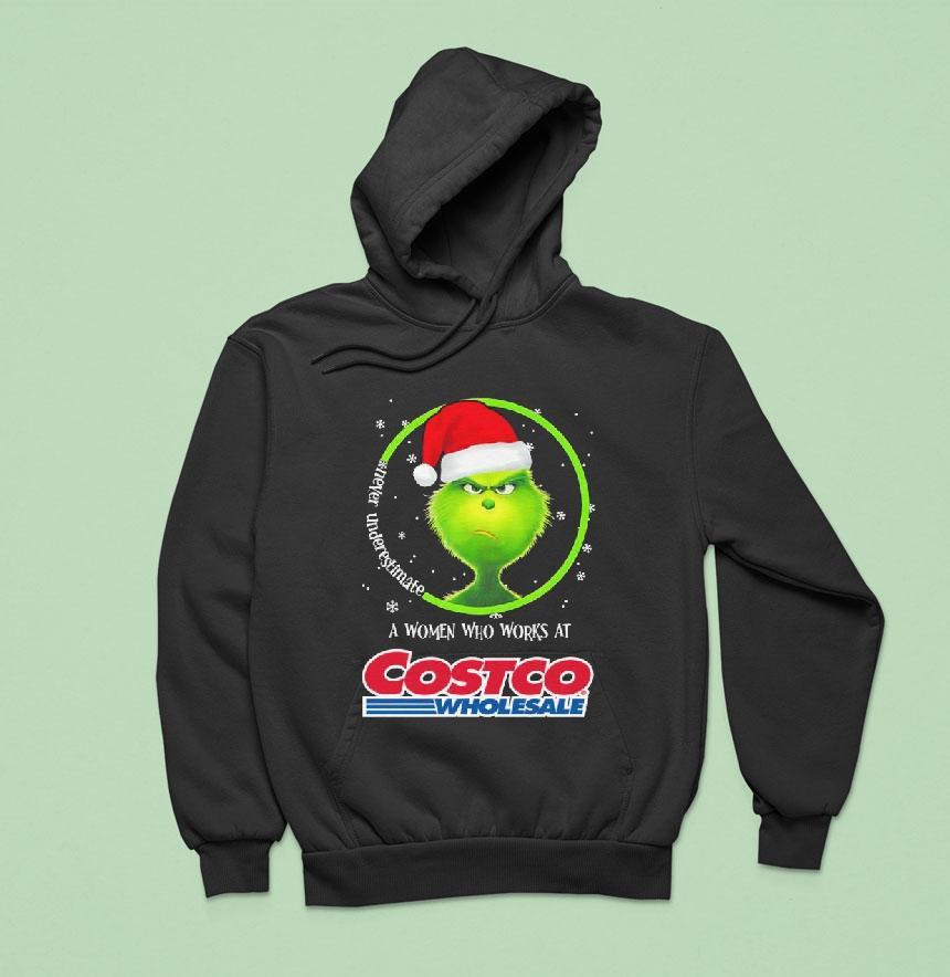 Grinch Santa Claus Never Underestimate A Women Who Works At Costco Wholesale Christmas Hoodie Grinch Santa Claus Never Underestimate A Women Who Works At Costco Wholesale Christmas Hoodie
