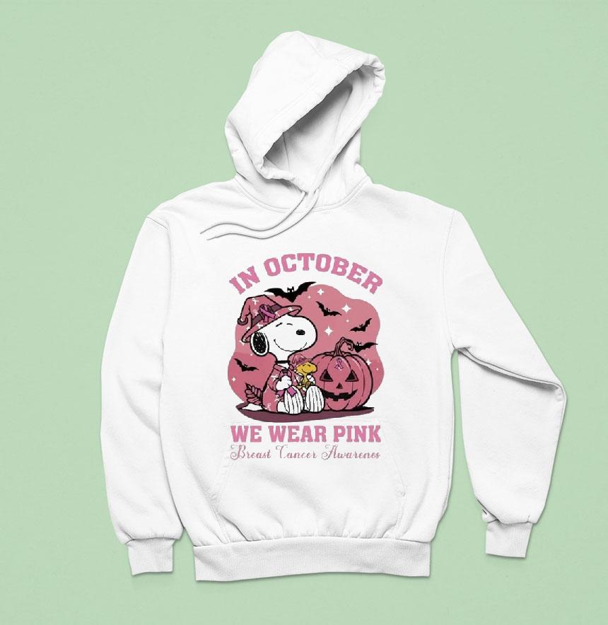 Snoopy The Peanuts In October We Wear Pink Breast Cancer Awareness Pumpkin Halloween Hoodie Snoopy The Peanuts In October We Wear Pink Breast Cancer Awareness Pumpkin Halloween Hoodie