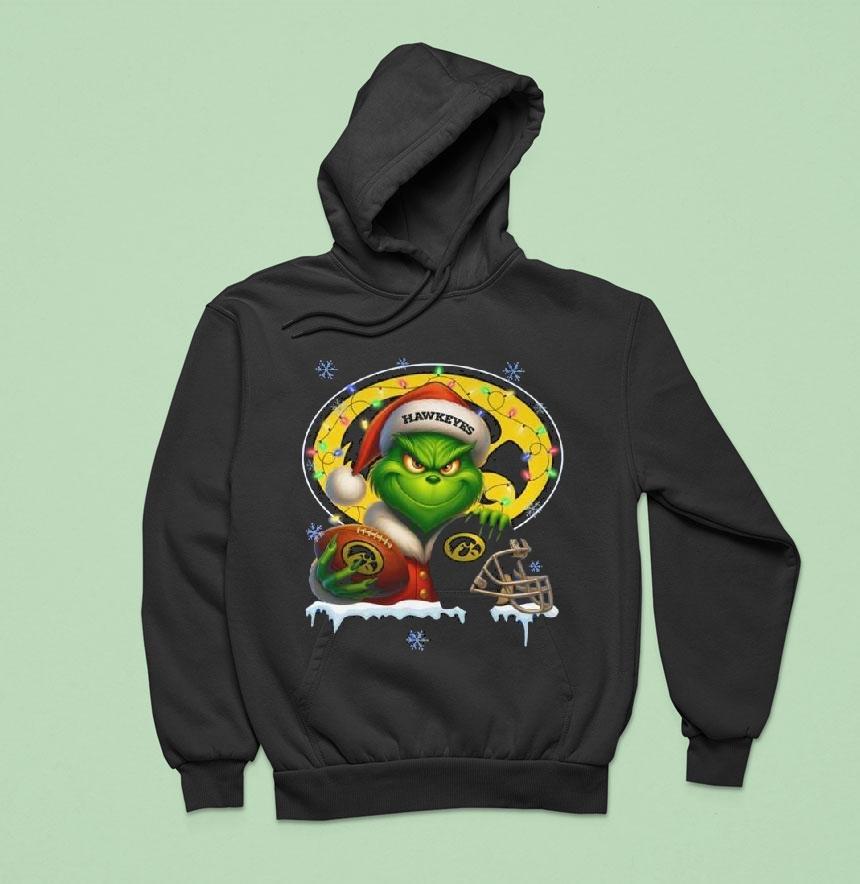 The Grinch X Ball And Helmet Iowa Hawkeyes Merry Christmas Hoodie The Grinch X Ball And Helmet Iowa Hawkeyes Merry Christmas Hoodie